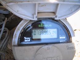 Digital water meter displaying a water usage reading