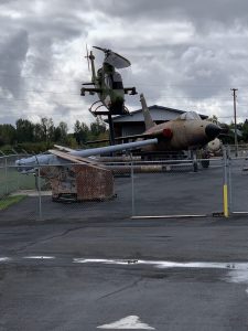 Underground PVC water pipe leak located near an aircraft display