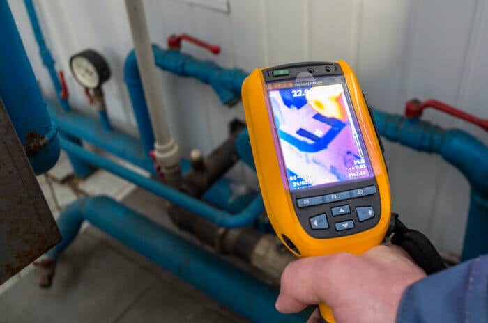 Thermal imaging camera detecting temperature differences in a building water system