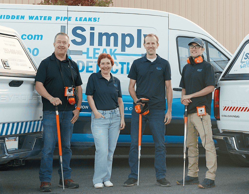 The Simply Leak Detection team with their vans and equipment